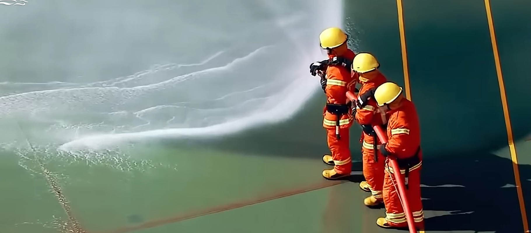 Firefighting team on oil tanker